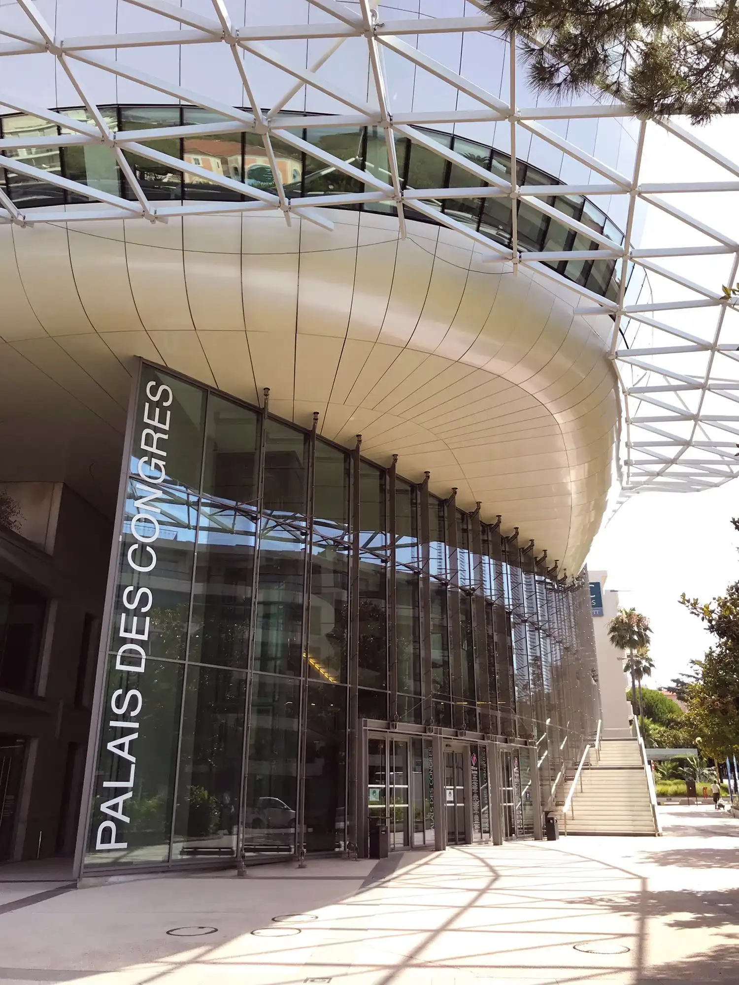The glass façade of the Juan-les-Pins Congress Center
